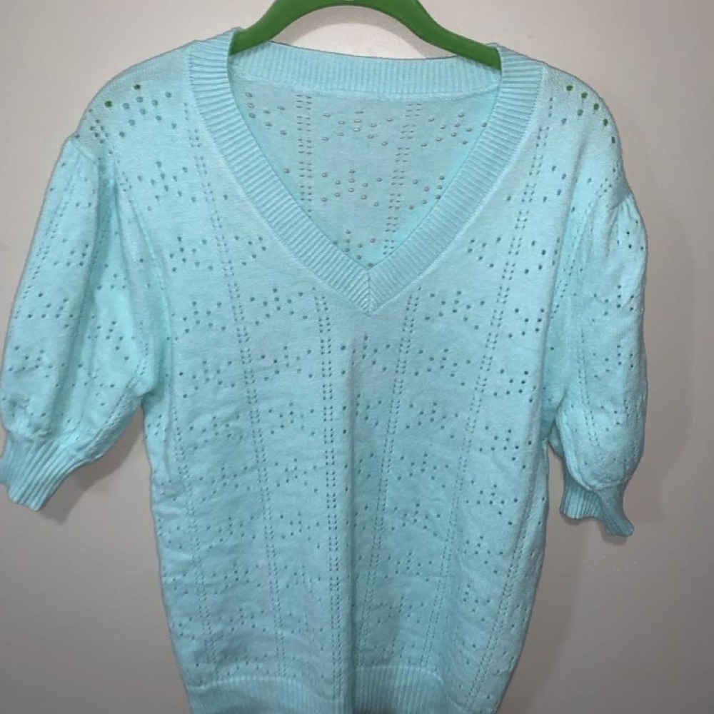 Baby blue knit sweater with eyelet lace pattern, size M